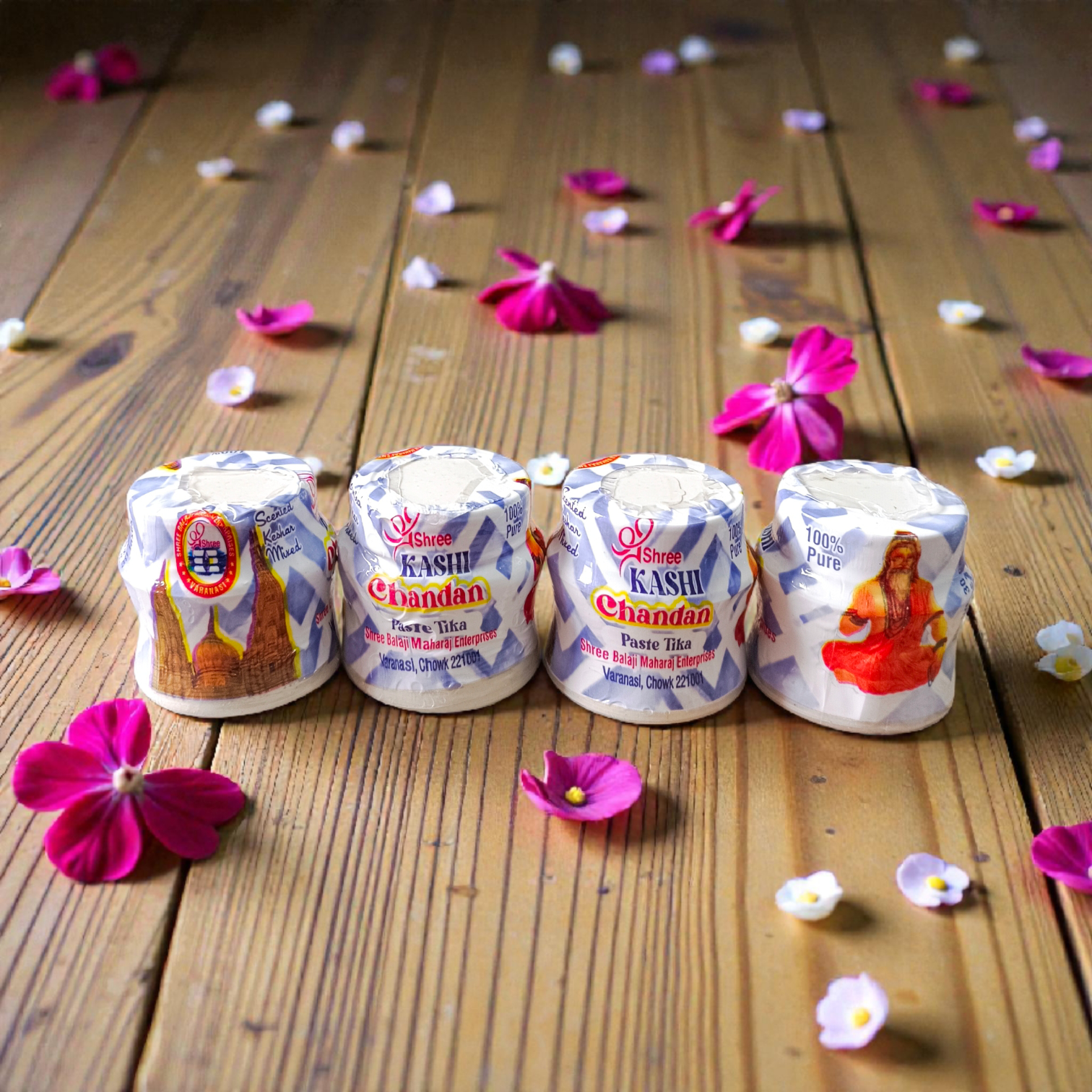 White chandan paste container used for tilak, puja, and religious rituals