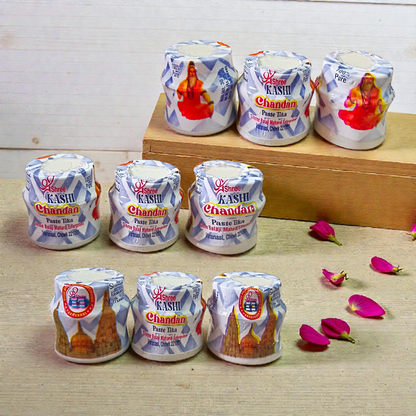 White chandan paste container used for tilak, puja, and religious rituals
