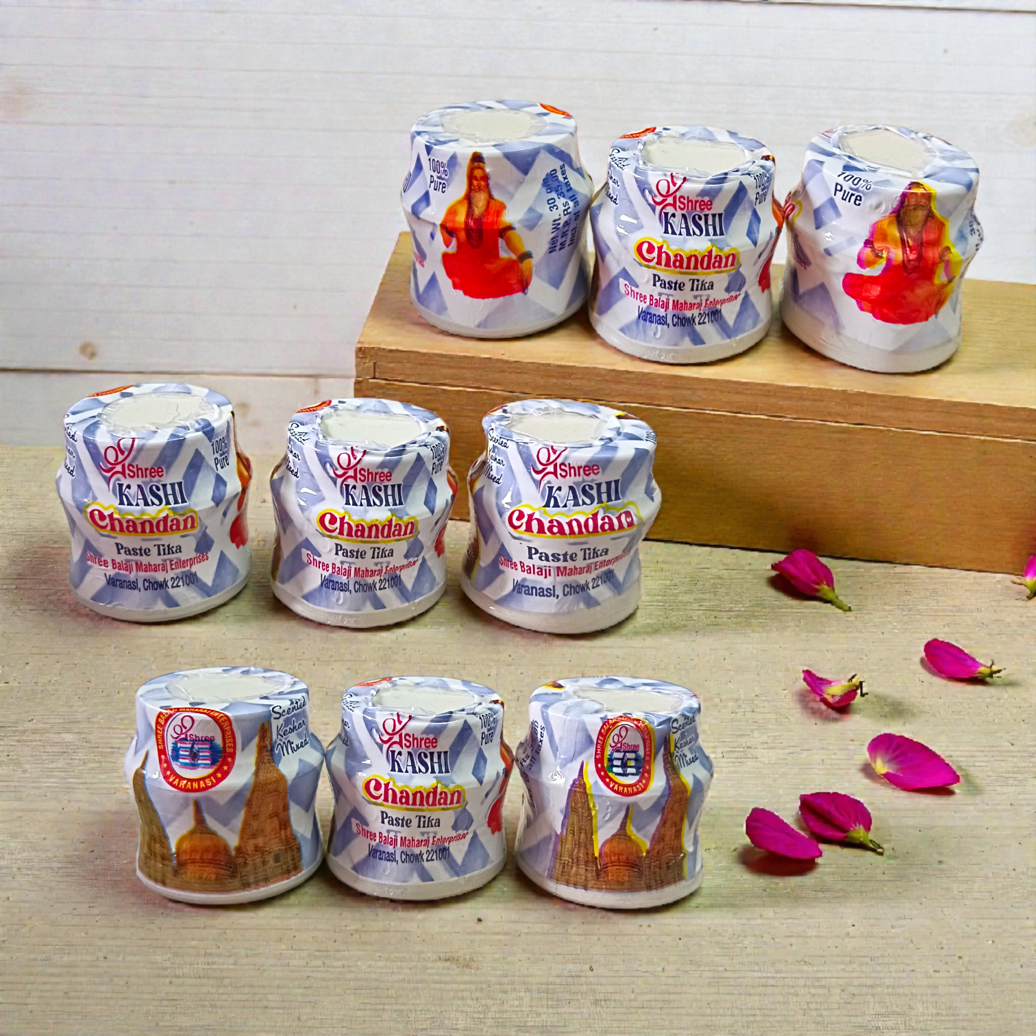 White chandan paste container used for tilak, puja, and religious rituals