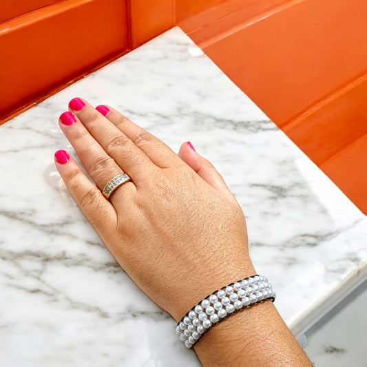 White pearl bracelet with adjustable sliding knot clasp, designed for girls and women, perfect for adding elegance to any outfit.