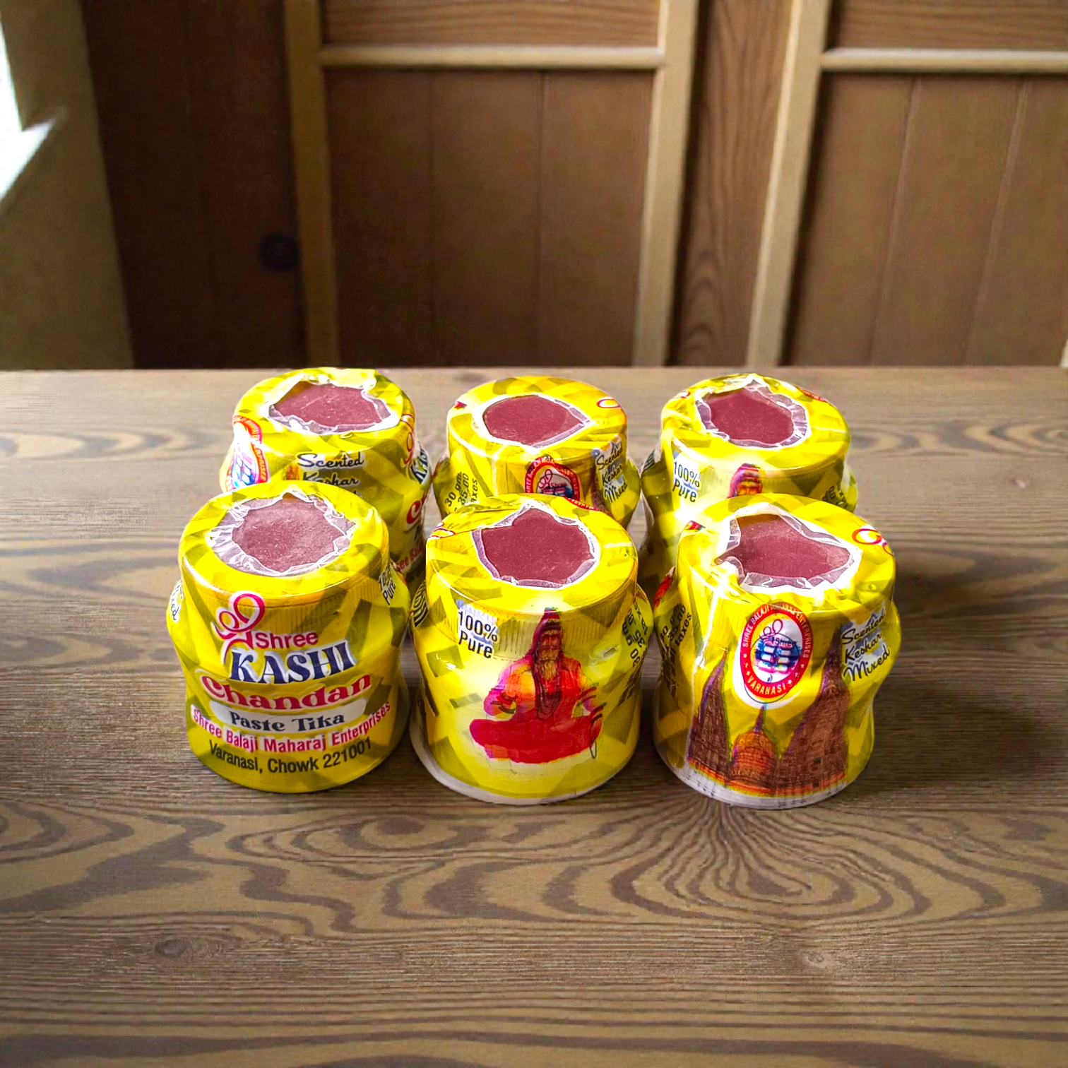Yellow sandalwood chandan paste container used for tilak and puja