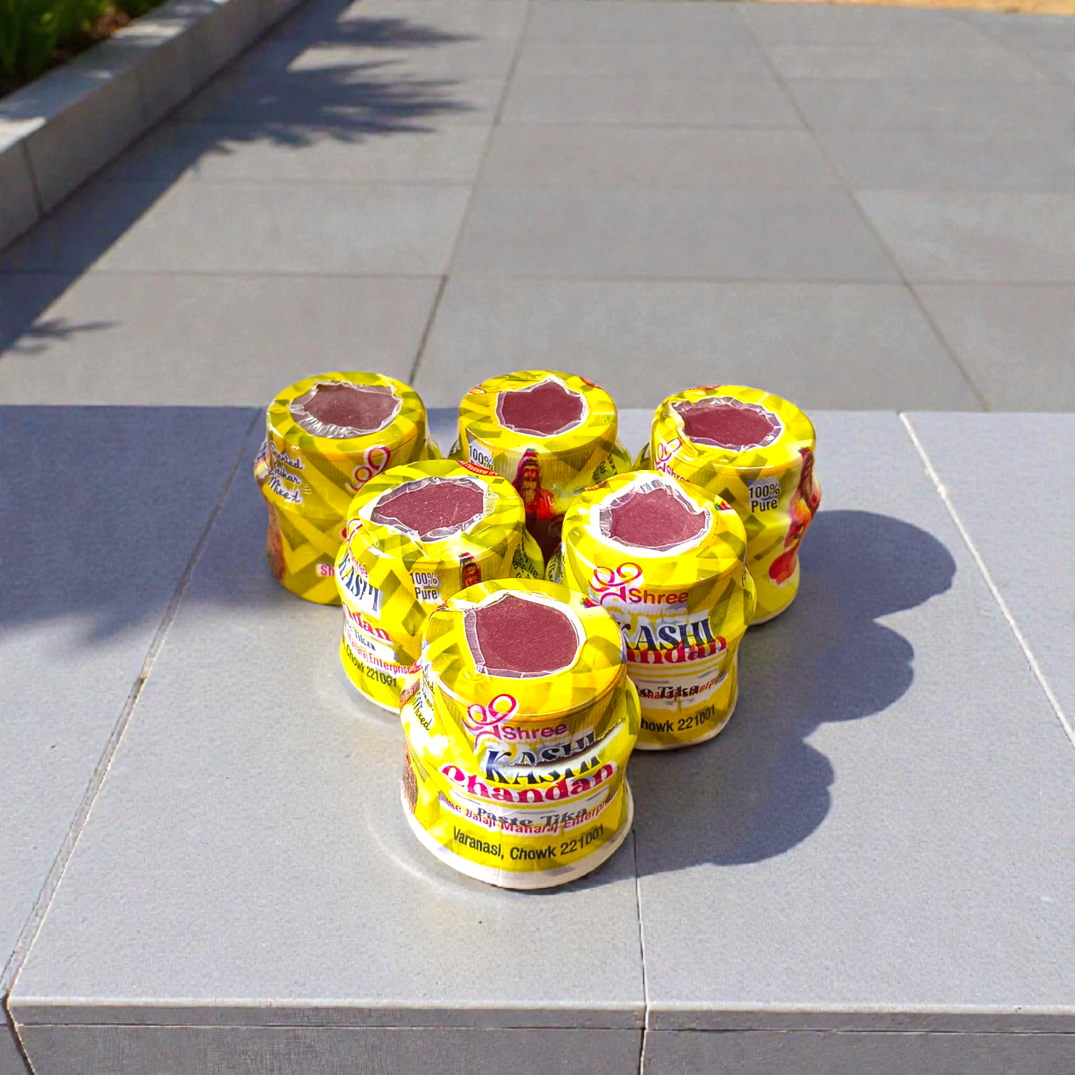 Yellow sandalwood chandan paste container used for tilak and puja