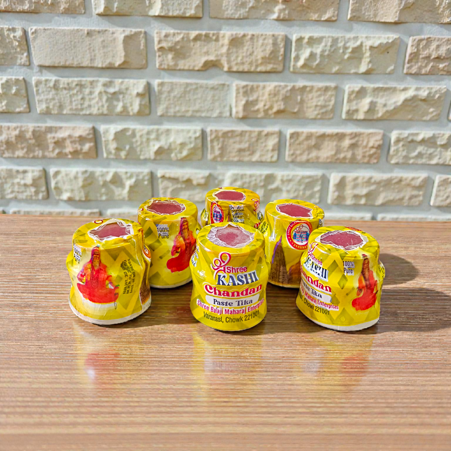 Yellow sandalwood chandan paste container used for tilak and puja