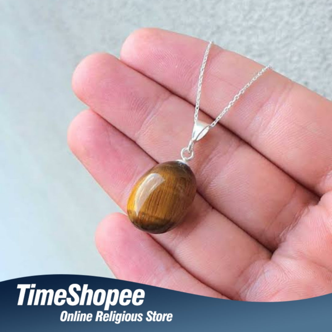 Lab-certified Tiger Eye Pendant with chain, featuring a golden-brown gemstone known for its grounding and protective properties.